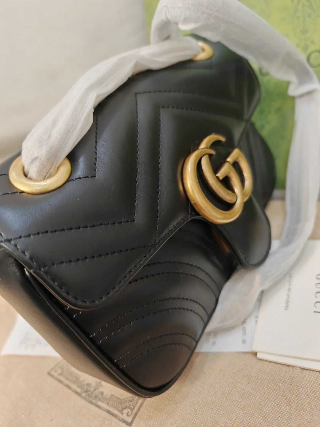 Bolsa de ombro pequena Gucci GG Marmont
