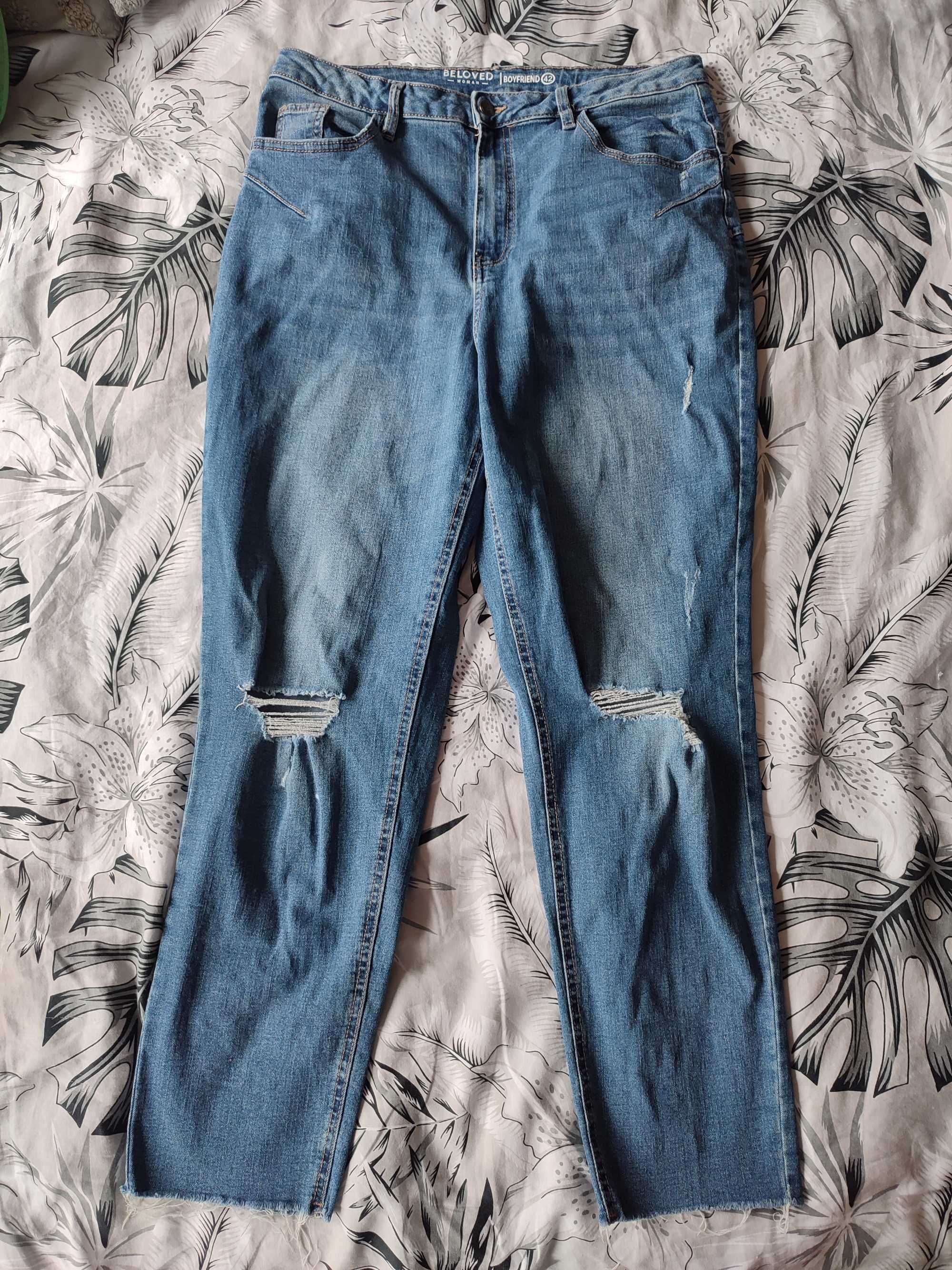 Spodnie damskie jeansowe boyfriend niebieskie z dziurami 42 XL