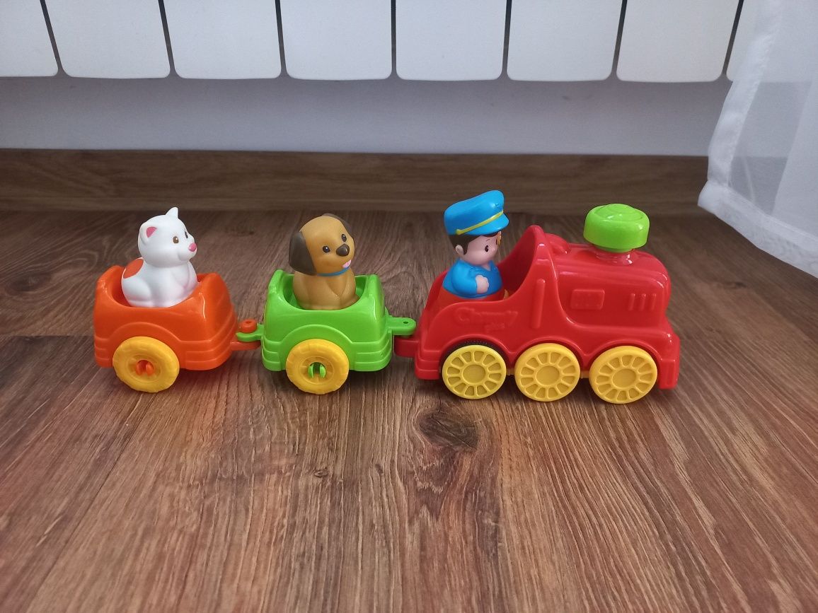 Pociąg lokomotywa z wagonikami i zwierzątkami