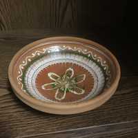 Глиняная тарелка