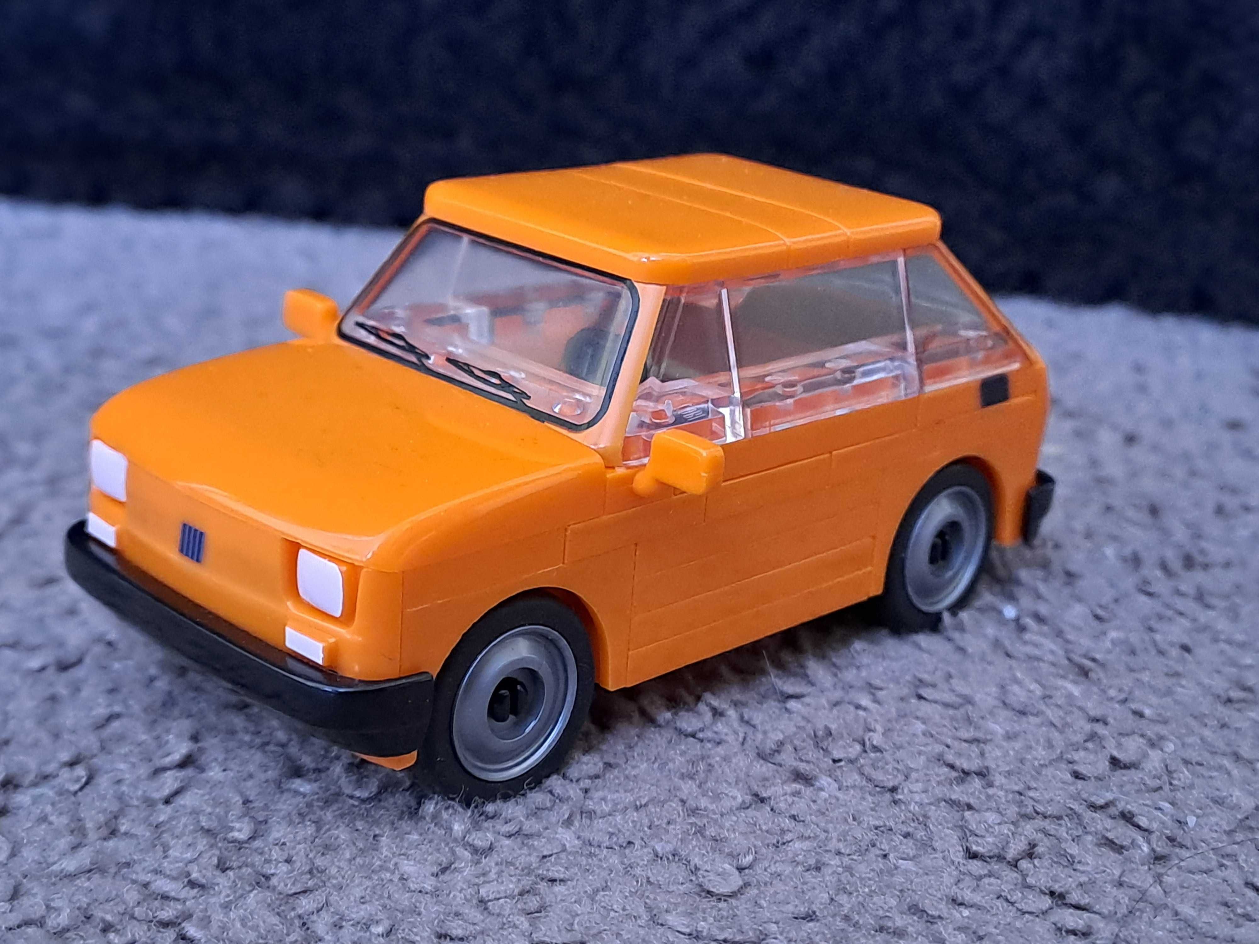 Fiat 126el pomarańczowy Cobi