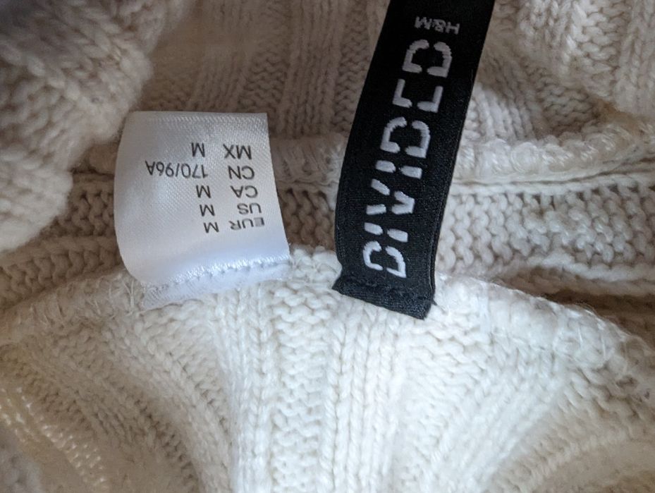 Kremowe ponczo peleryna z golfem gruby splot z wełną H&M M 38 oversize