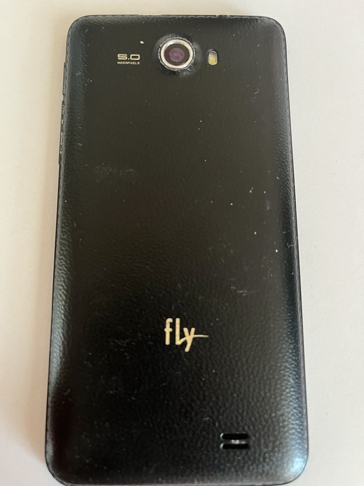 Телефон FLY  б / у .