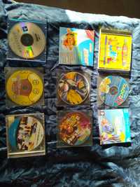 CDs com jogos de criança, música, filmes etc