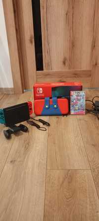 Nintendo switch + case mario + super mario odyssey