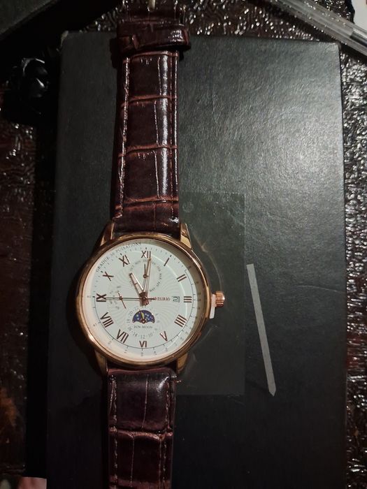 Продам позолочений годинник