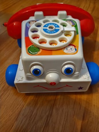 Fisher-price telefon samochodzik na kółkach zabawka rusza oczami
