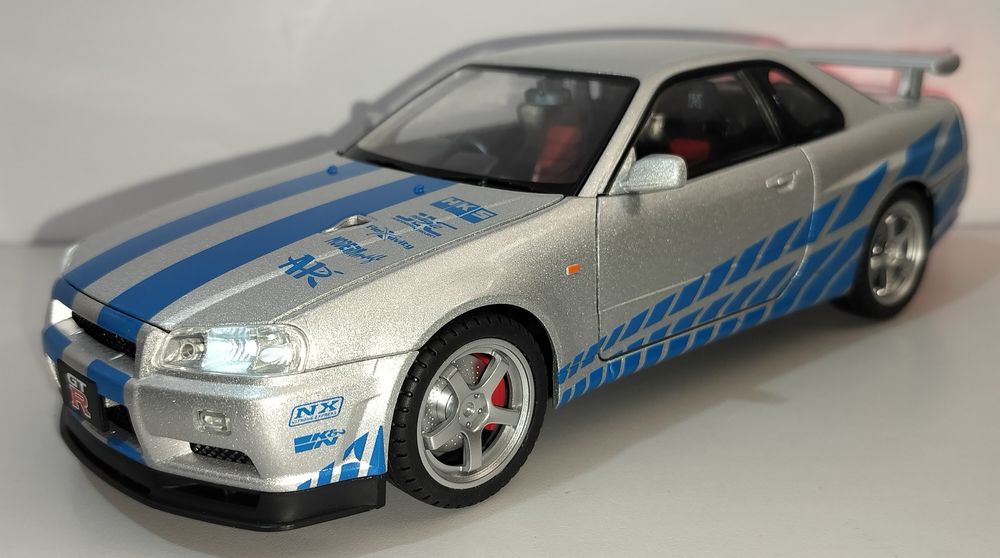Nissan Skyline GT-R R34 модель 1:18 Jinlifang Металл звук свет