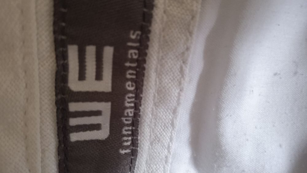 Білі широкі льняні брюки. we