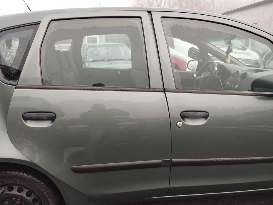 Mitsubishi Colt VI Z30 5D 1.1i 2005r.Drzwi tylne prawe.