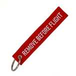 Porta chaves remove before flight
