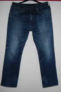 Męskie spodnie dżinsowe Lee M pas43/dł.102