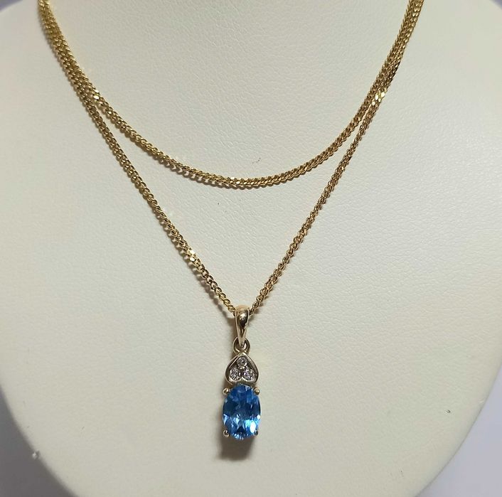 Wisiorek, przywieszka z topazem blu i diamentami, złoto 9K, poł. XX w.