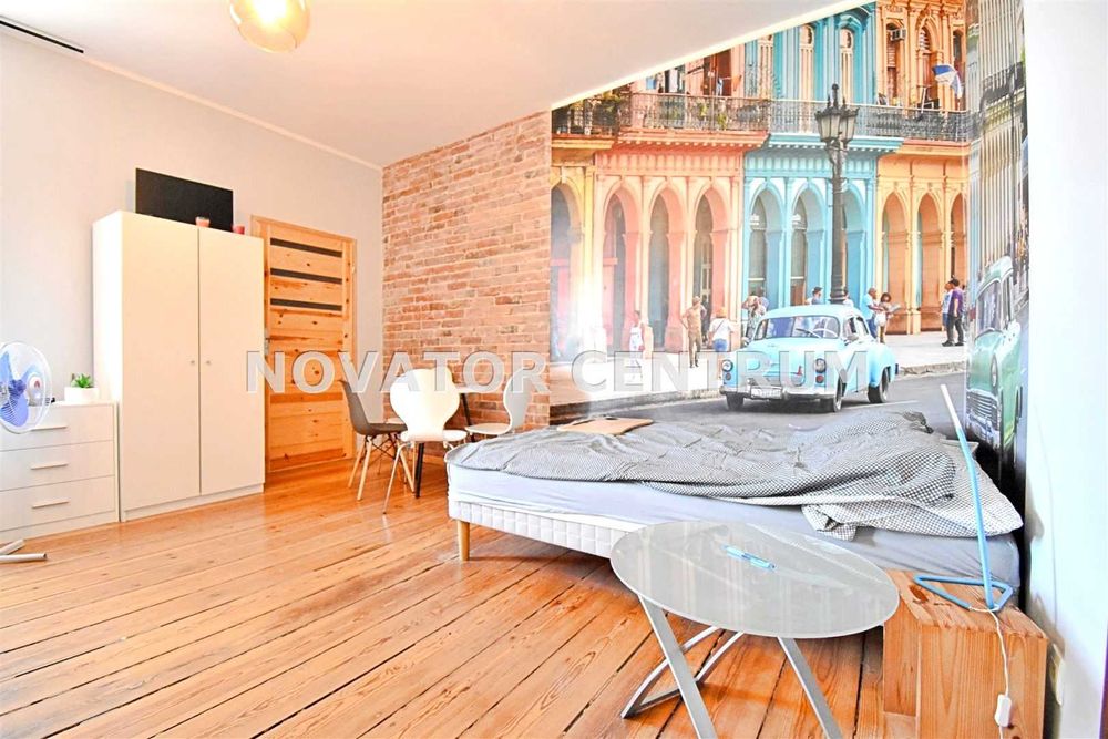 Doskonale wyposażona loftowa kawalerka z patio w  Centrum