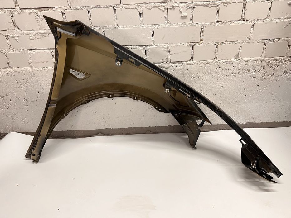 Оригінальне переднє Ліве Крило на Tesla Y чорне