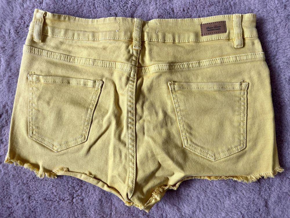 Żółte szorty jeansowe z przetarciami S