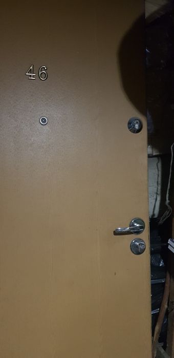 Drzwi wewnatrzklatkowe wejściowe z zamkami klamka kluczami