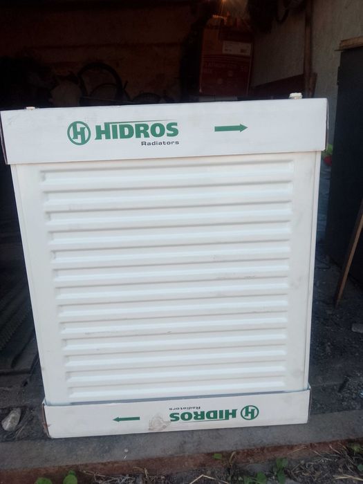 продам  новую  батарею  и   мойку  с краном  .