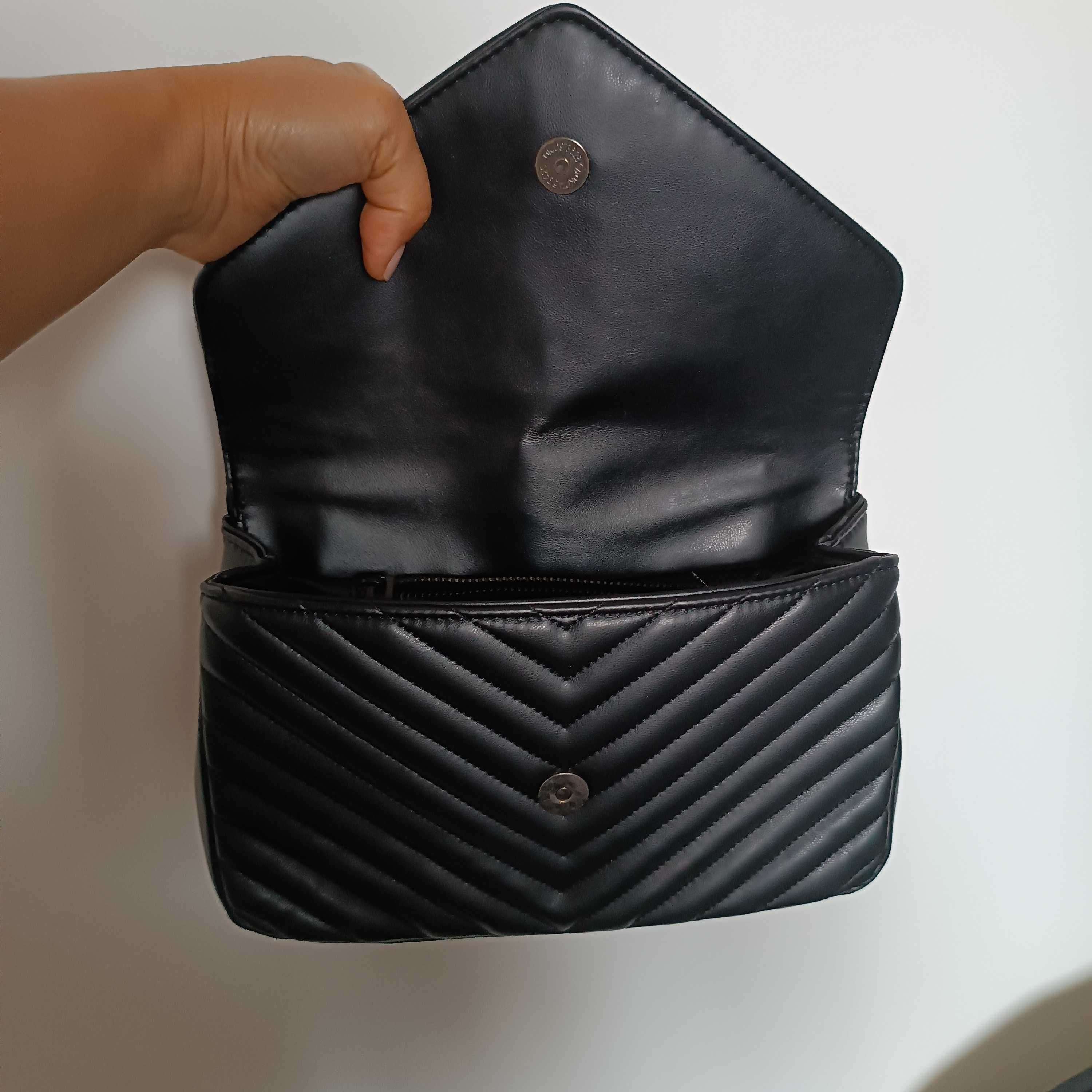 Bolsa clutch YSL