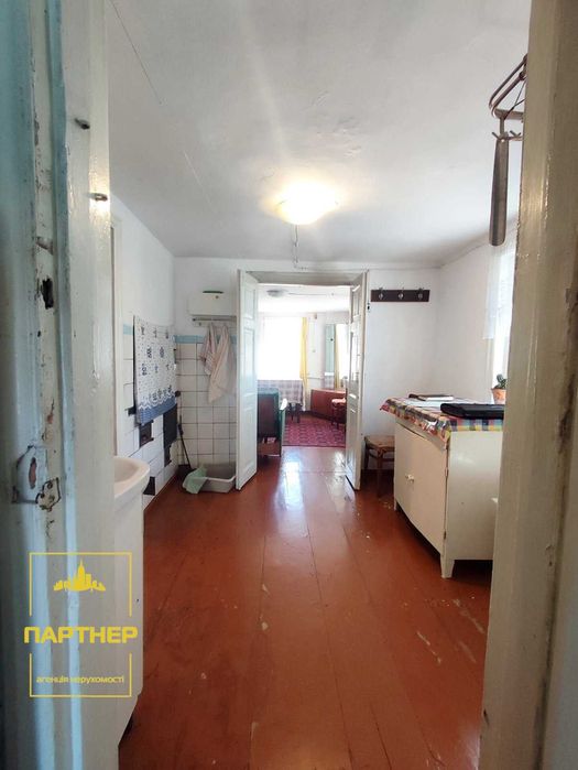 Продам  окрему  частину   будинку  у  нагірній частині Кременчука