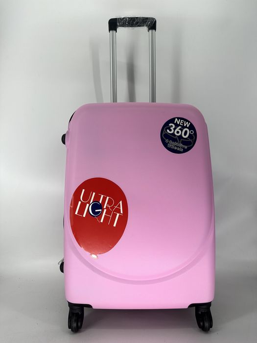 Nowa walizka średnia różowa, pudrowy róż