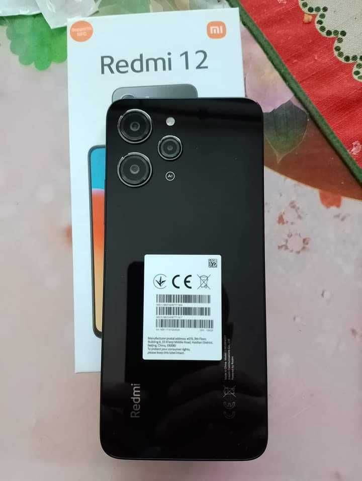 Продам новый телефон с чехлом Redmi 12 4-128