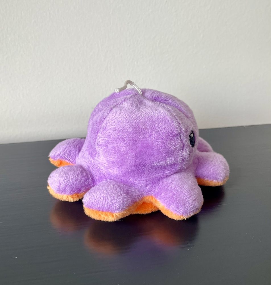 Pequeno peluche reversível de polvo