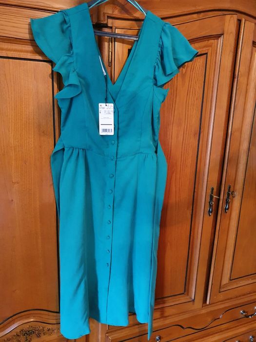 Casacos e Vestidos de Senhora.