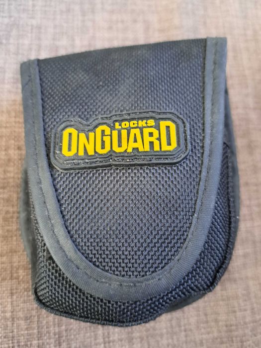 Замок на колесо мотоцикла з сигналізацією