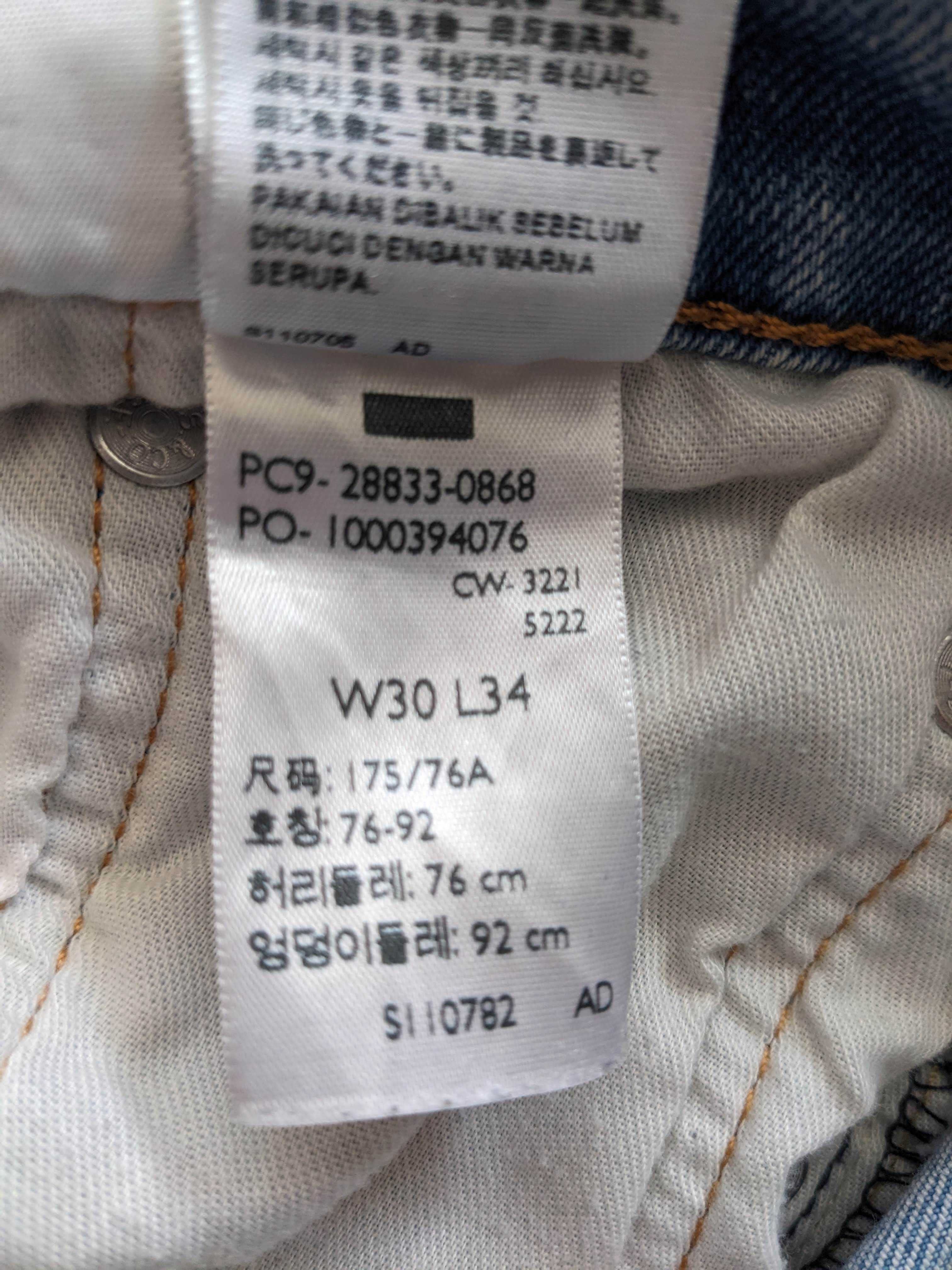 Męskie jeansy Levis 512 niebieskie spodnie W30 L34