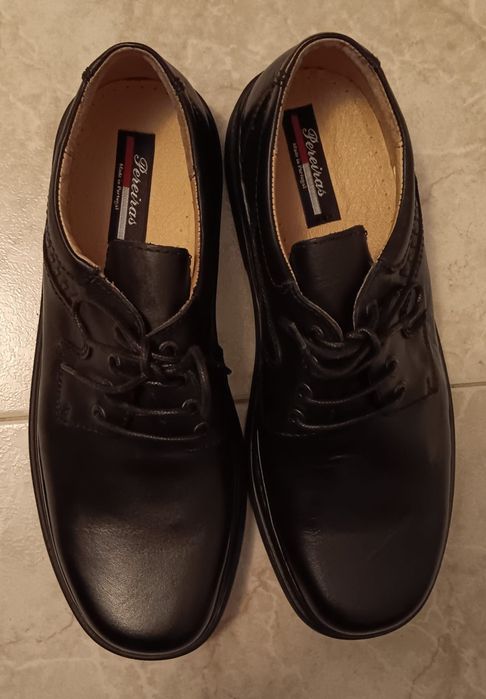 Sapatos de Homem novos