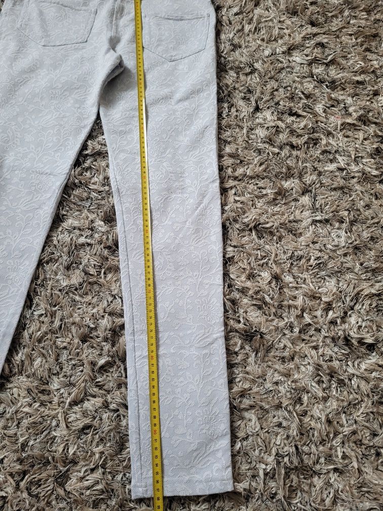 Damskie jasne wygodne spodnie z gumką w pasie roz XL