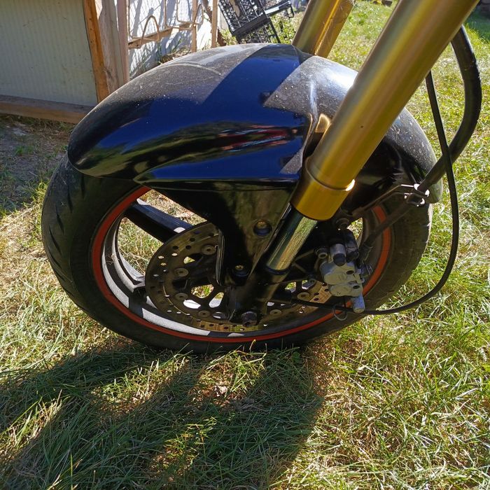 Мотоцикл Хюсонг 250 gt.