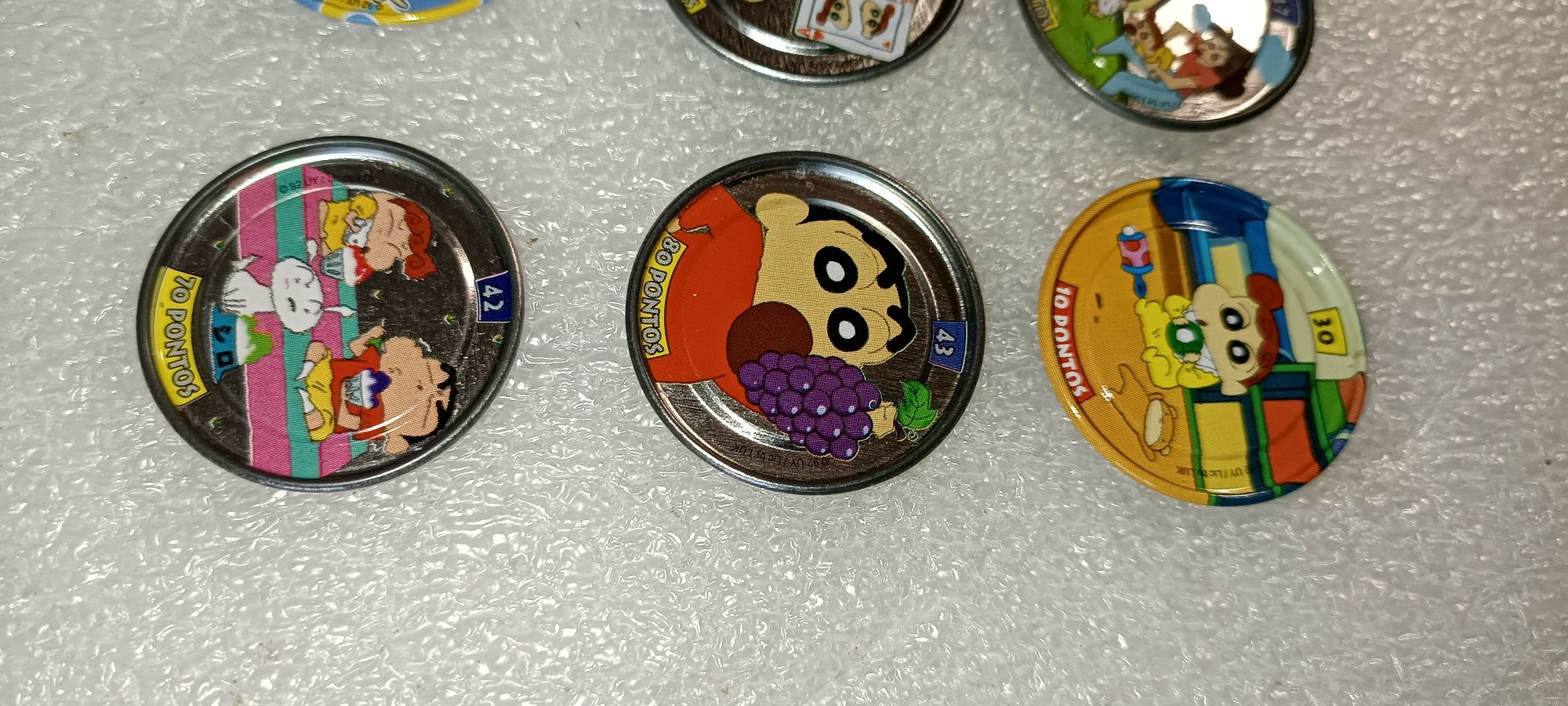 8 tazos coleção Shinchan Bollycao