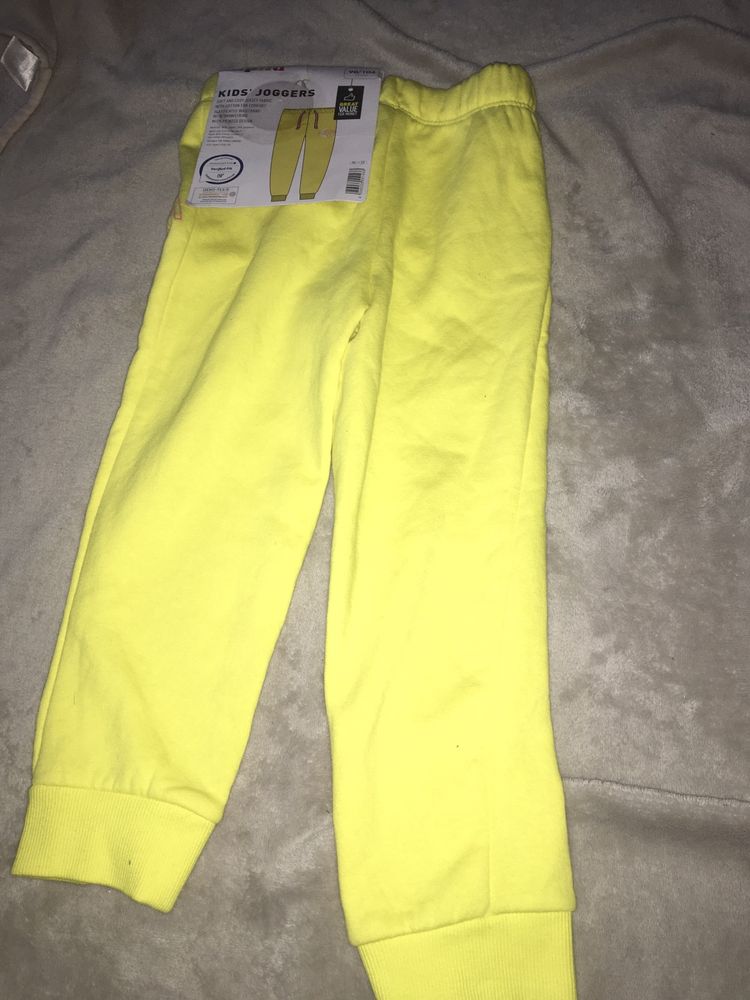 NOWE żółte spodnie dresowe Lupilu roz. 98/104