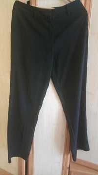 Czarne materiałowe eleganckie spodnie XL marki Louis Charles