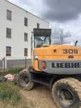 Liebherr 309  koparka kołowa stan bdb