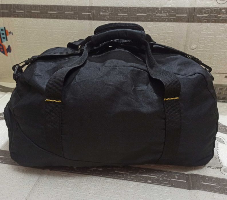 Сумка дорожня спортивна чорна Diadora з плечовим ременем 55х25х30