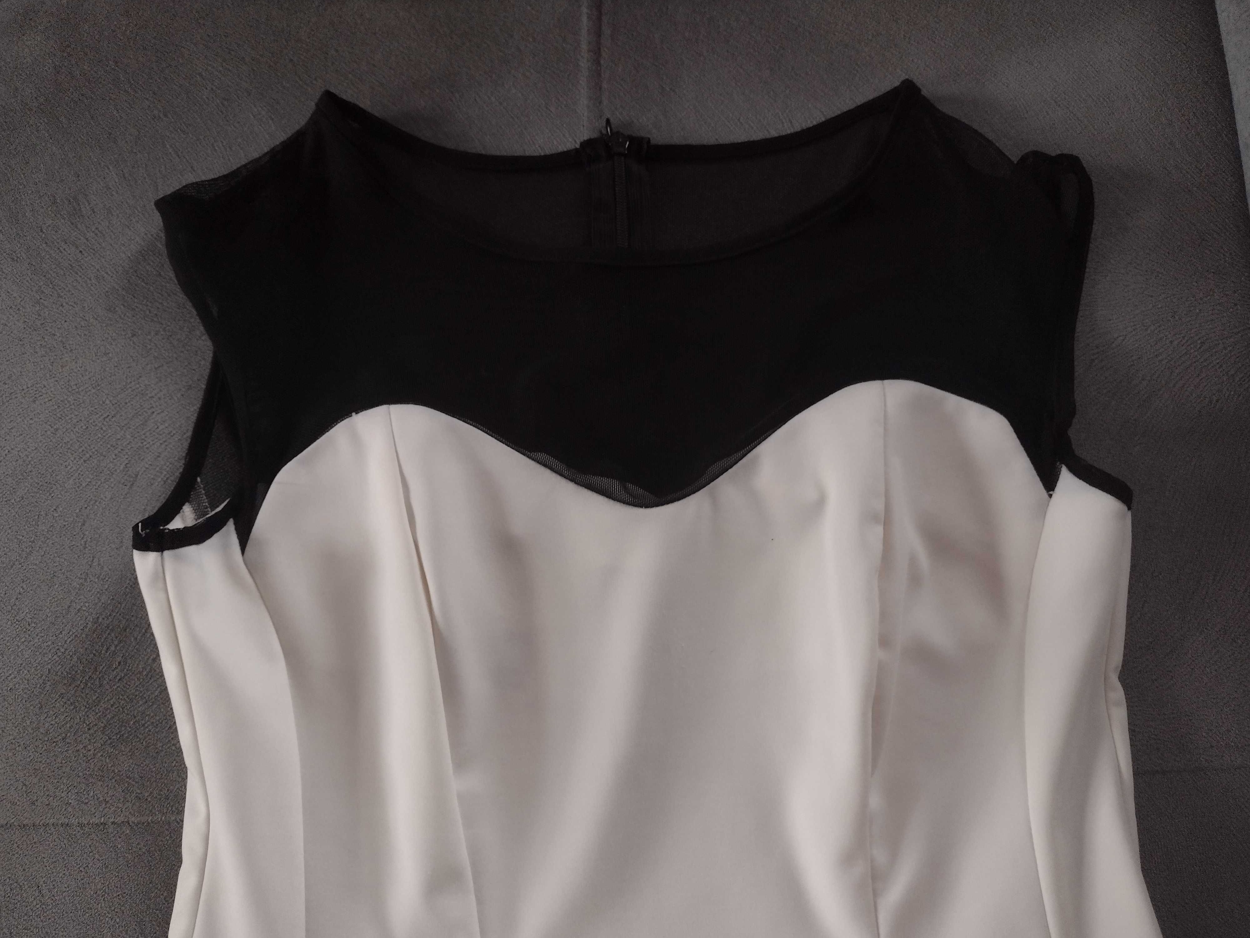 Elegancka sukienka ecri z czarną siateczką na dekoldzie rozm. 36.