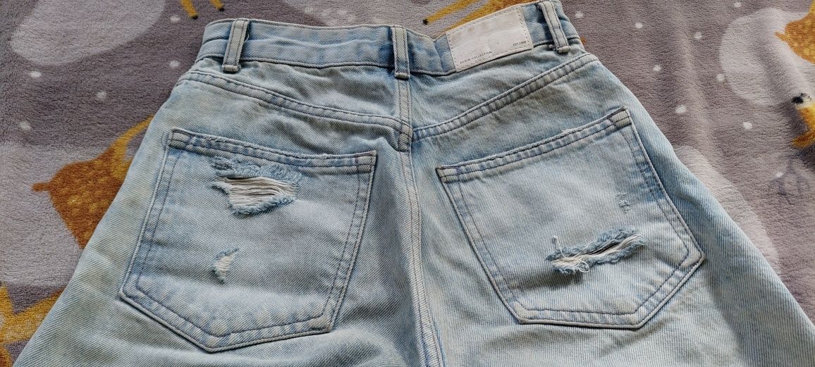 Spodnie jeansy z dziurami Bershka rozmiar 34