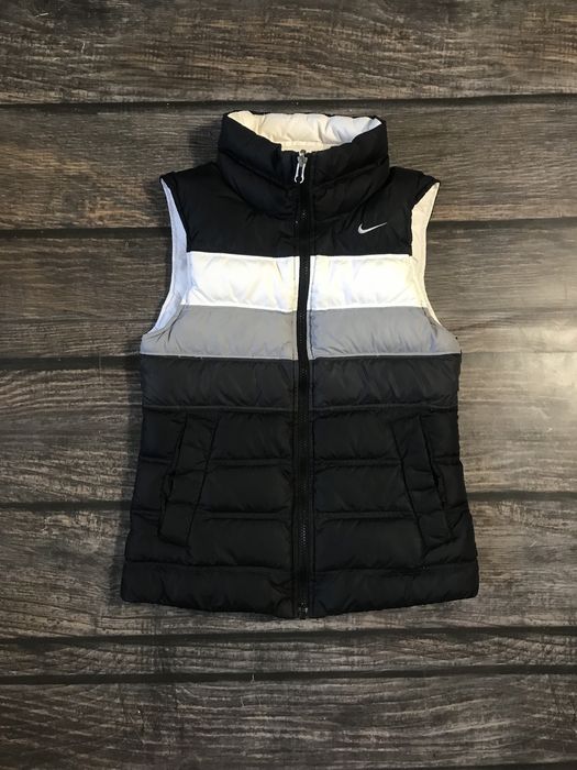 Nike натуральна двостороння пухова жіноча жилетка