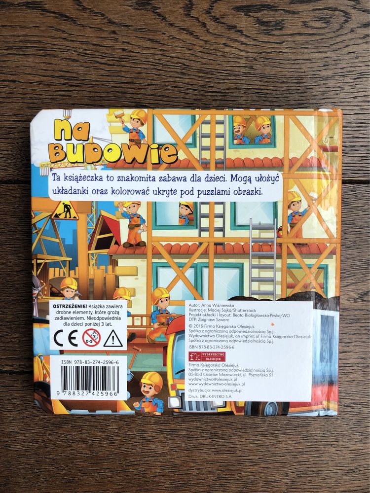 Na budowie. Książeczka i puzzle 4 układanki 3+