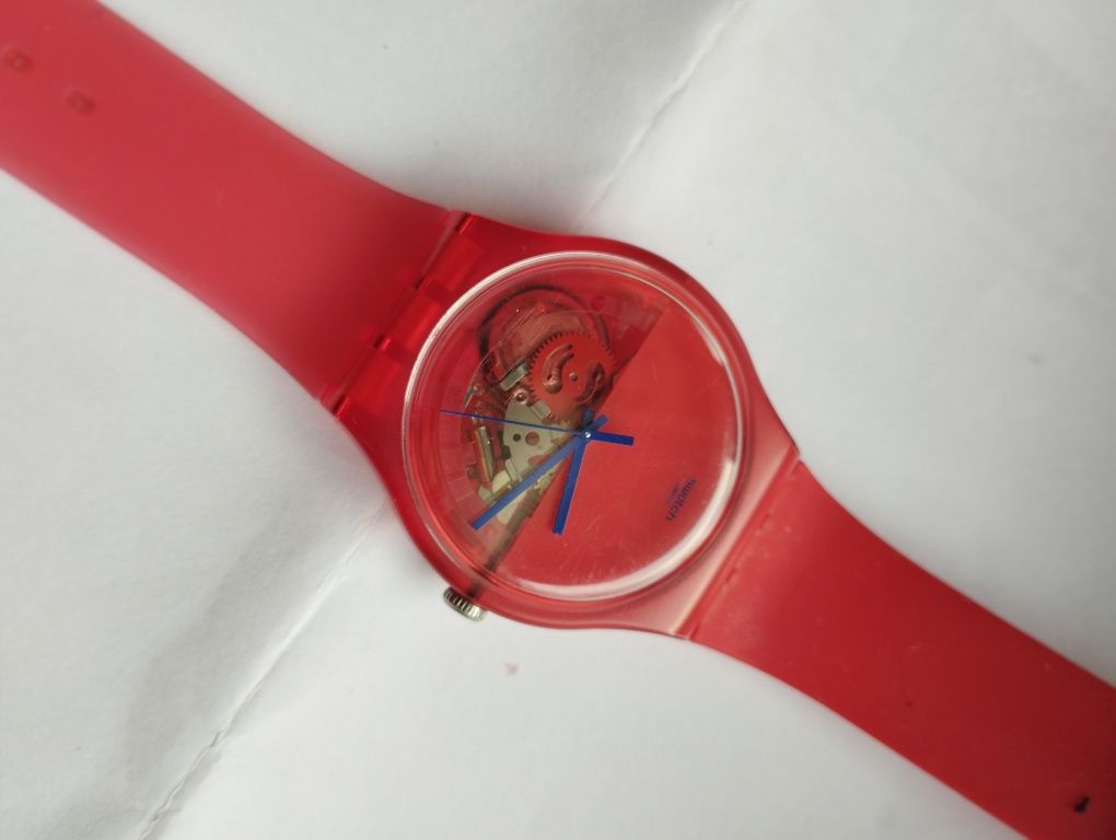 Swatch zegarek czerwony przeźroczysta koperta