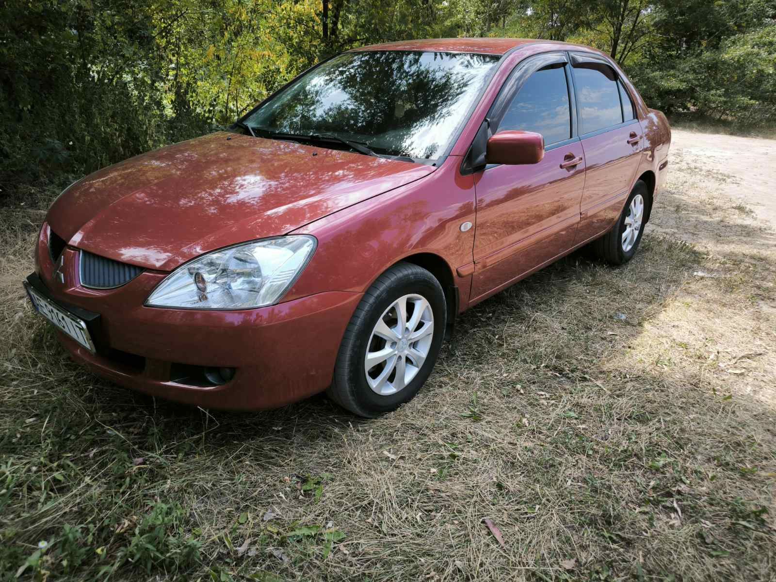Mitsubishi Lancer 9 2004 (2005) 1.6, автомат