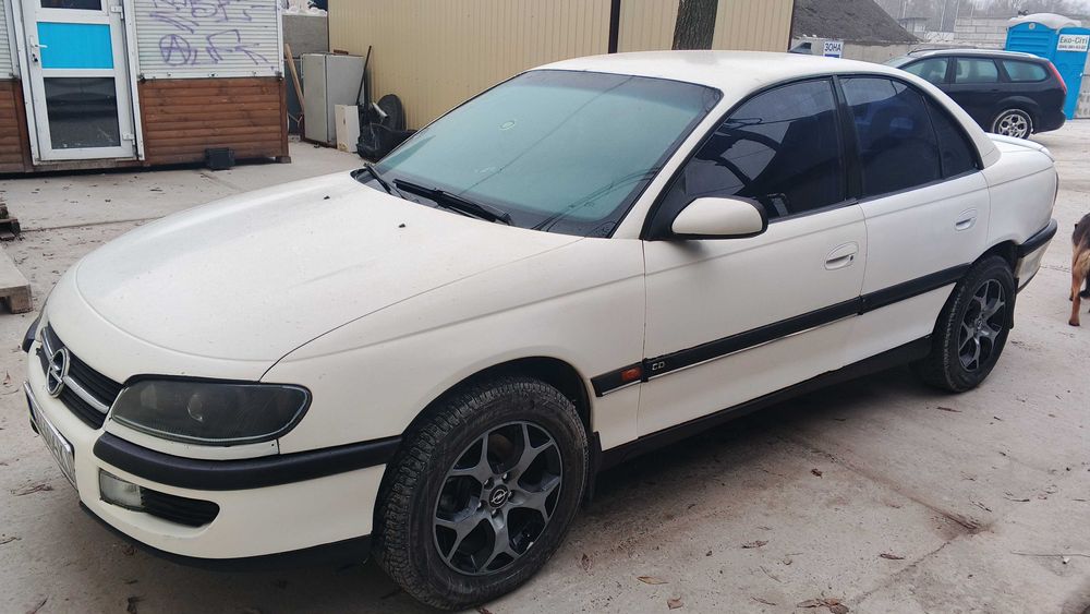 Опель Омега б 2.0