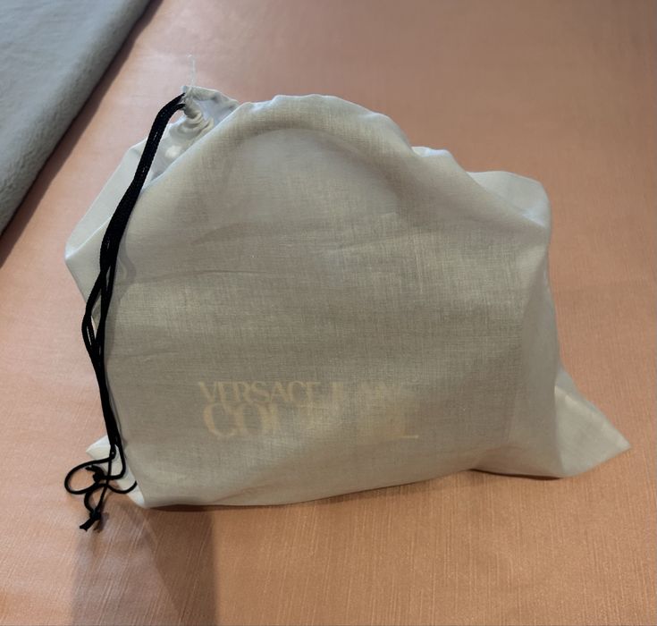 Bolsa versage Jeans Couture como nova