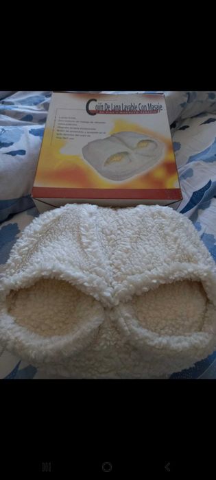 Almofada para pés, de lã, com magneto-terapia.