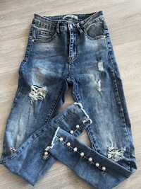 spodnie jeansy jeansowe rurki dziury dżety butik xs