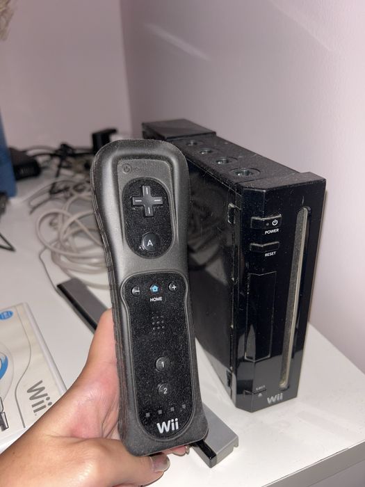 Wii com jogos como nova