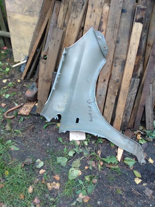 Błotnik przedni lewy Corsa D